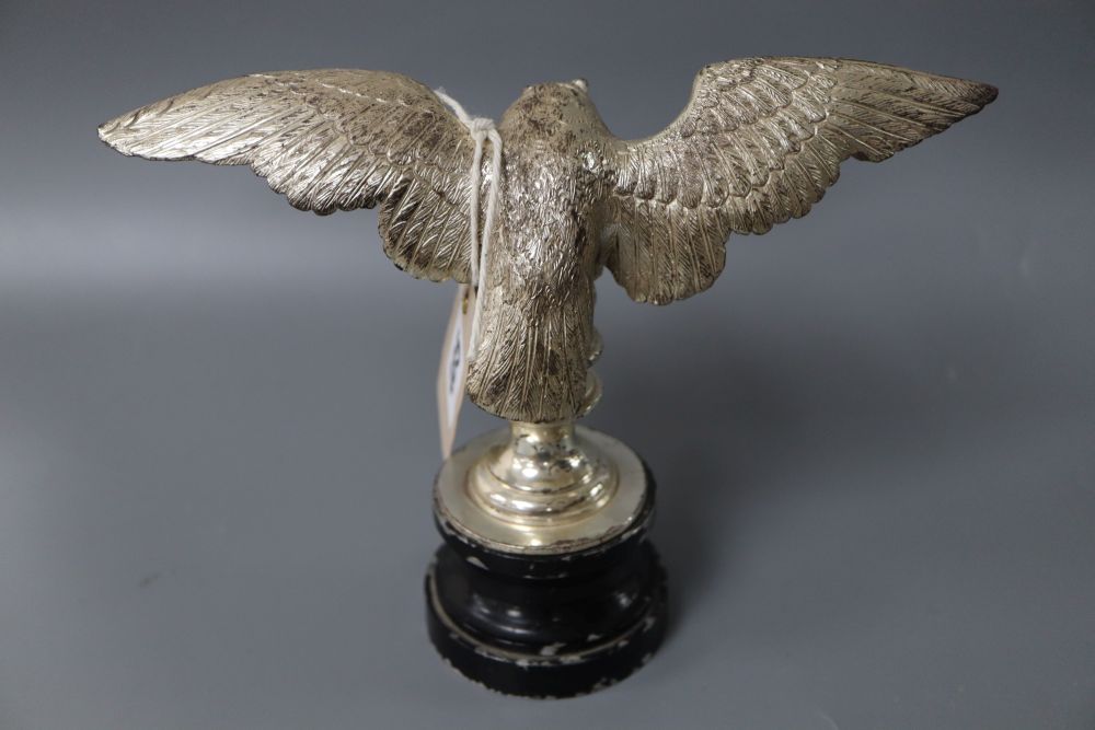 A silvered metal owl car mascot, height 15cm